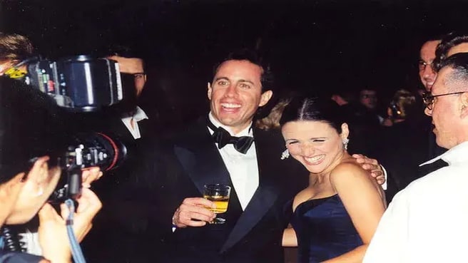Jerry Seinfeld and Julia Louis Dreyfus in a party