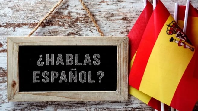 Spanish Vocabulary - Hablas Espanol written on a chalkboard.