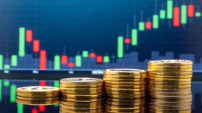 Stock Market candles and coins.