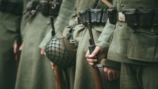 World war 2 soldiers standing in a row.