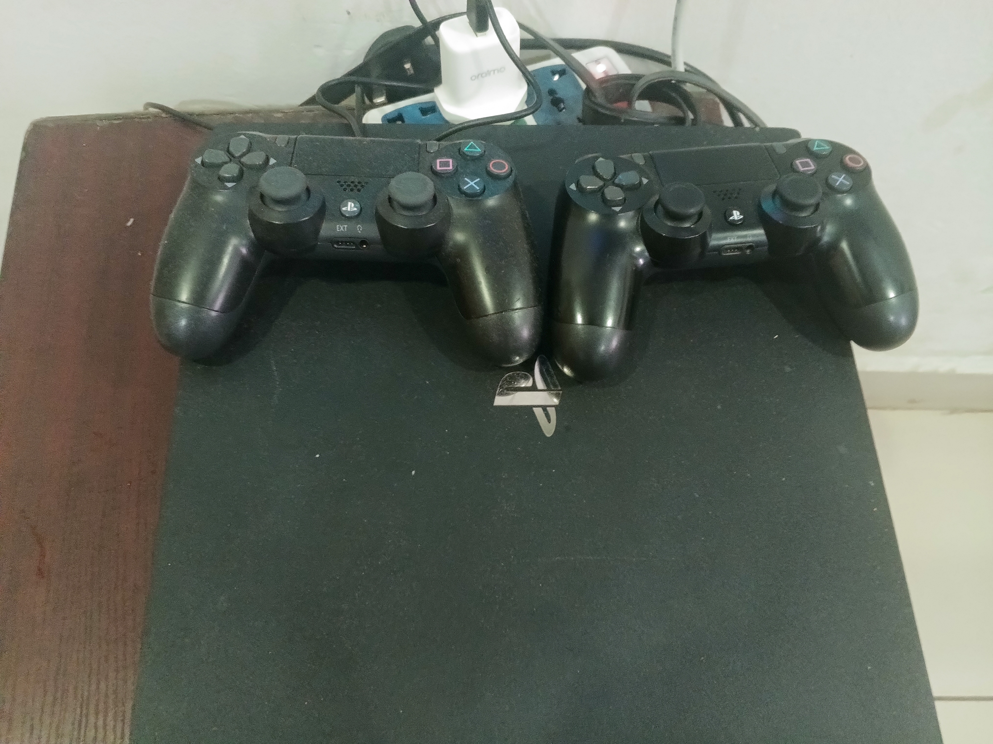 Sony PlayStation 4 Pro Console with 2 Controllers - image 1