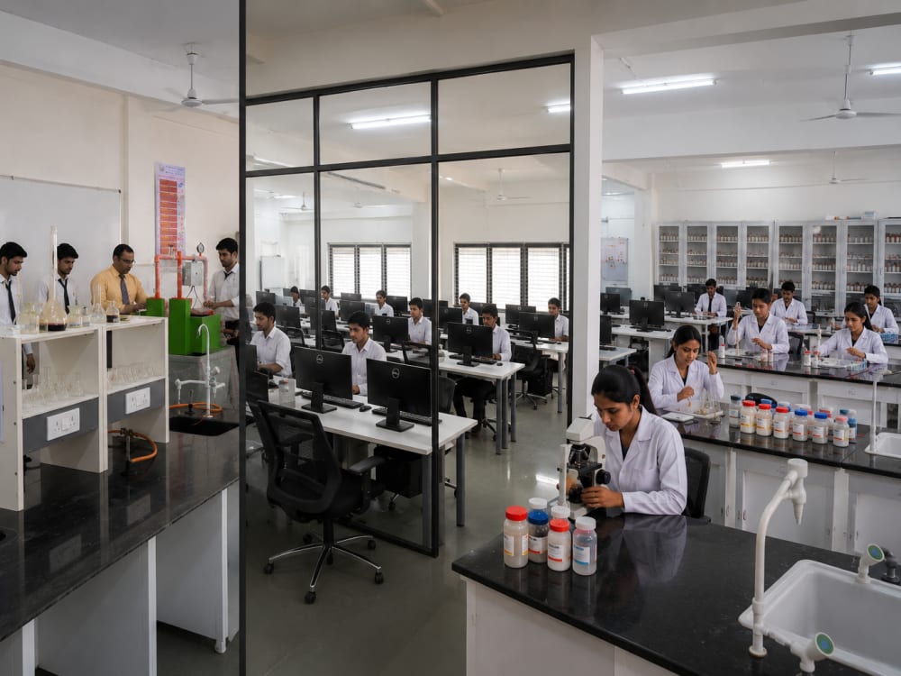 SAITM students working in a technical lab