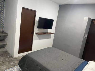 Habitaciones por día con cama y TV en Unidad Morelos — Unidad Morelos