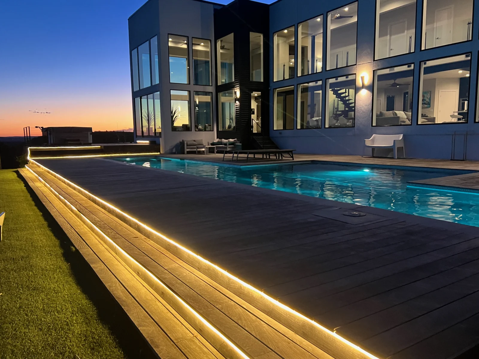 SmartHauz designed property at night with integrated outdoor lighting