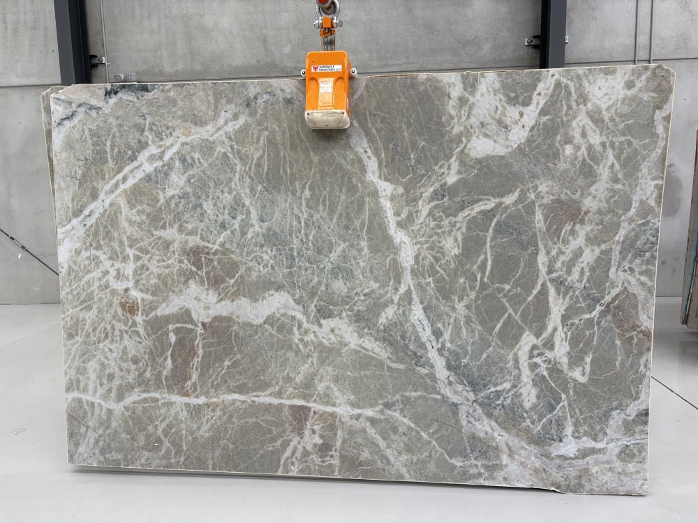 Martini quartzite full slab, polished warm taupe-grey with dense fractured white and rust-toned veining