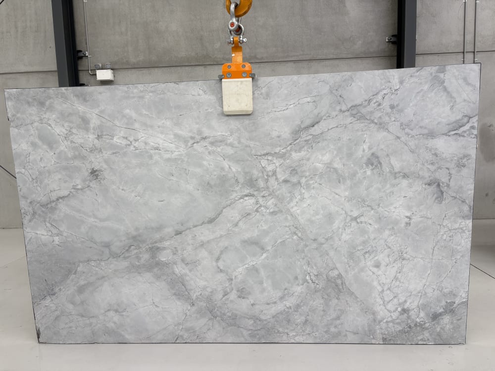 Super White dolomite full slab, honed bright white with soft grey cloud movement