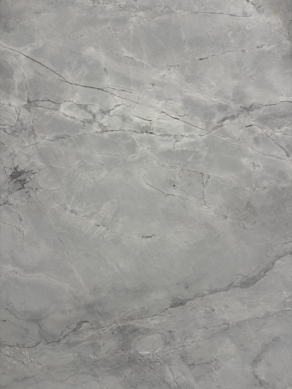 Super White dolomite detail, even white honed surface with faint drifting grey veining