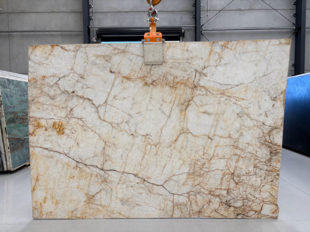Gold Cristallo quartzite full slab, polished warm cream-white with golden and rust veining