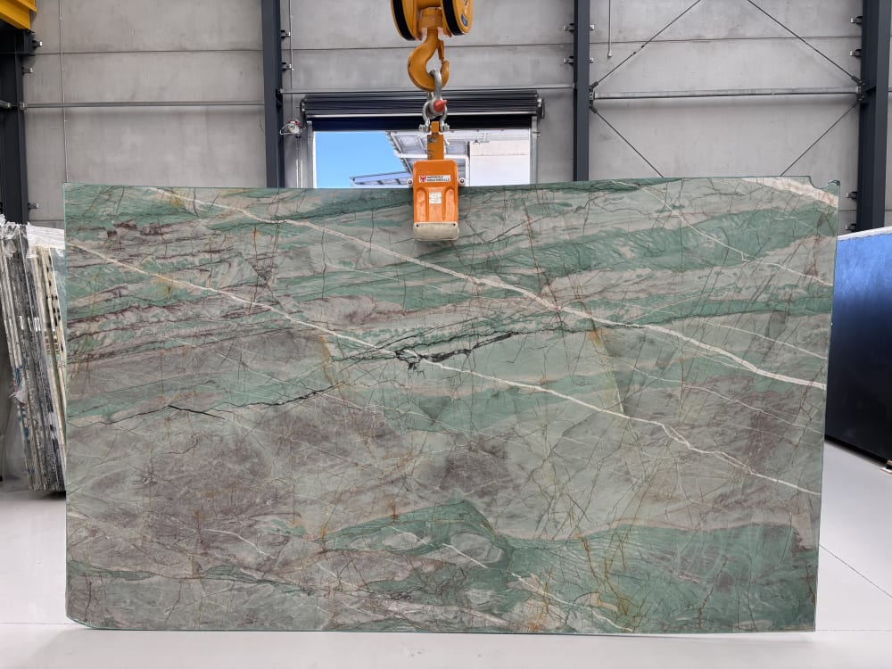 Vesuvio quartzite full slab, honed sage-green and mauve movement with dark fissure veining