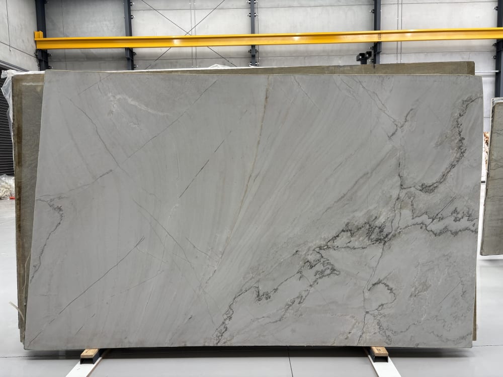 White Santorini quartzite full slab, honed soft white-grey with gentle linear movement and fine veining