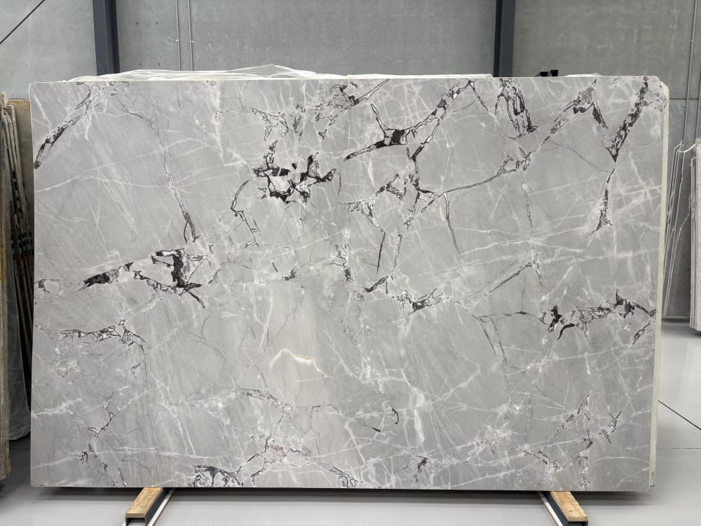 Violetta dolomite full slab, honed cool grey with white crystalline and dramatic black angular veining