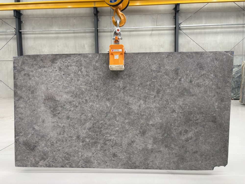 Tundra Grey limestone full slab, honed even mid-grey with soft mottled texture and fine white veining