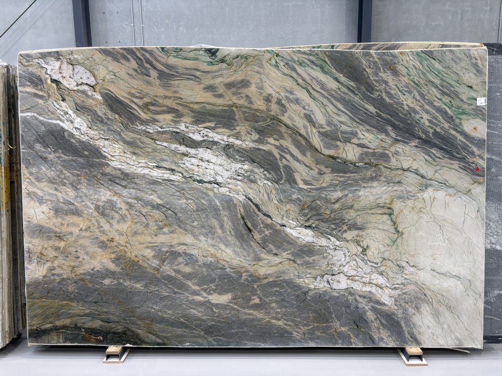 Van Gogh quartzite full slab, polished with sweeping ochre, olive and grey-blue painterly movement
