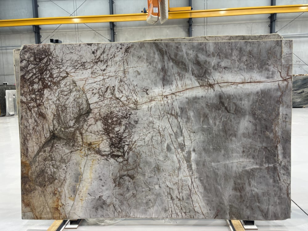Ice Lake quartzite full slab, polished pale icy grey-white with fine branching brown veining