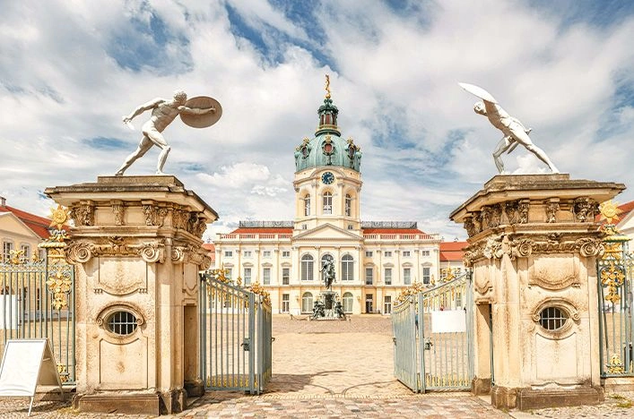 Statue-topped gates leading to Charlottenburg Palace in Berlin