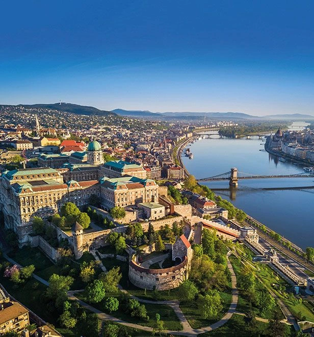 The Danube glows beneath Budapest’s grand Parliament