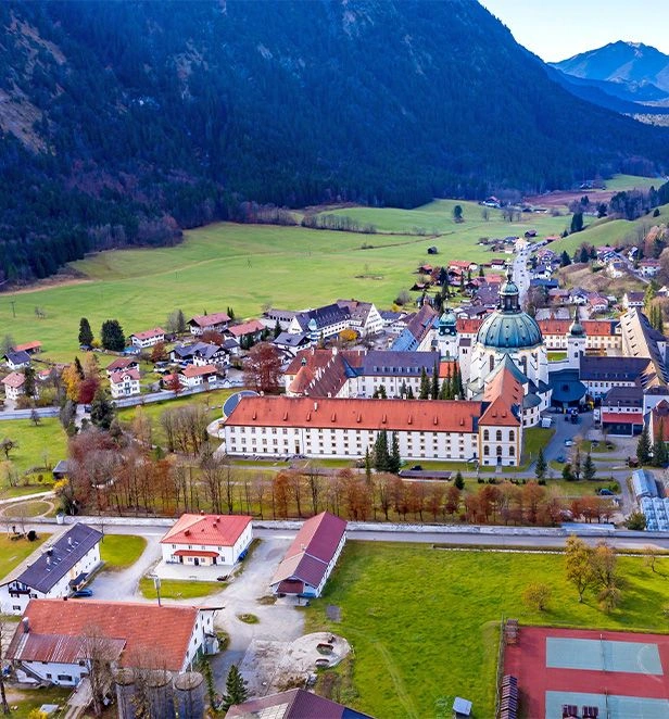 Aerial view of Ettal Abbey in a Bavarian Alpine valley 