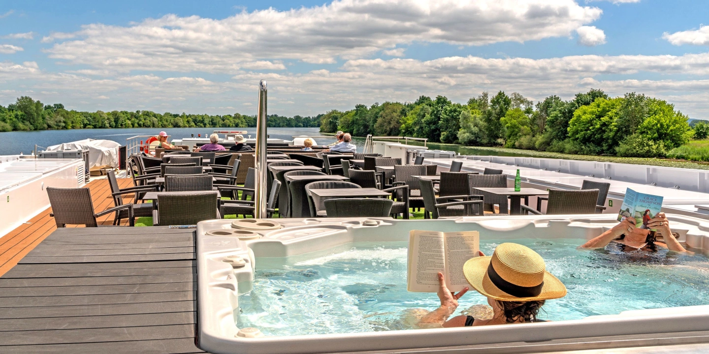 Guests relaxing in the Sun Deck Vitality Pool on Scenic Sapphire
