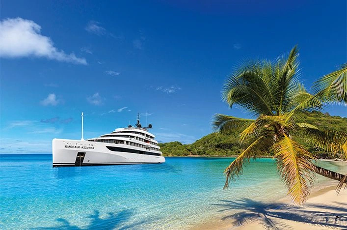 Emerald Azzurra anchored beside a Caribbean beach