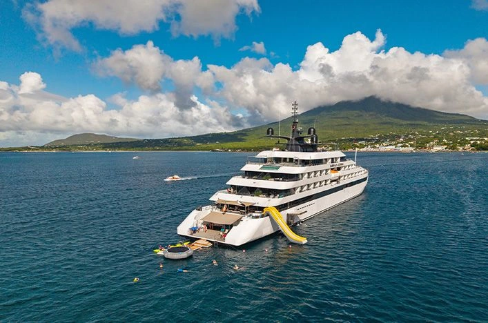 Guests swimming from Emerald Azzurra’s Marina Platform in the Caribbean