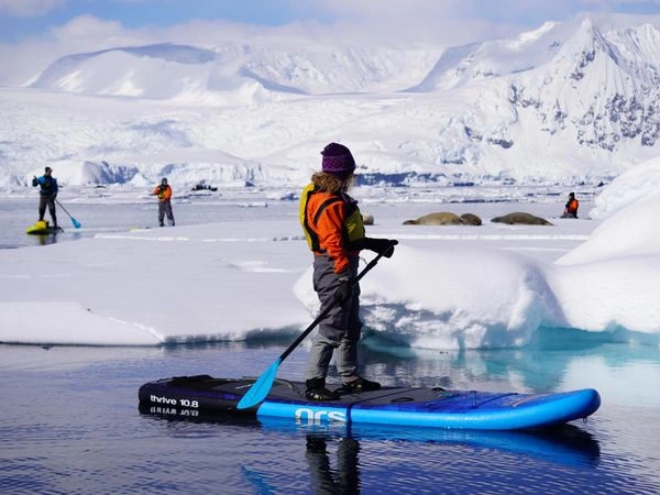 Scenic Eclipse paddleboarding in Antarctica