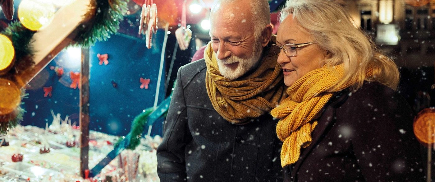 Couple shopping at Christmas market