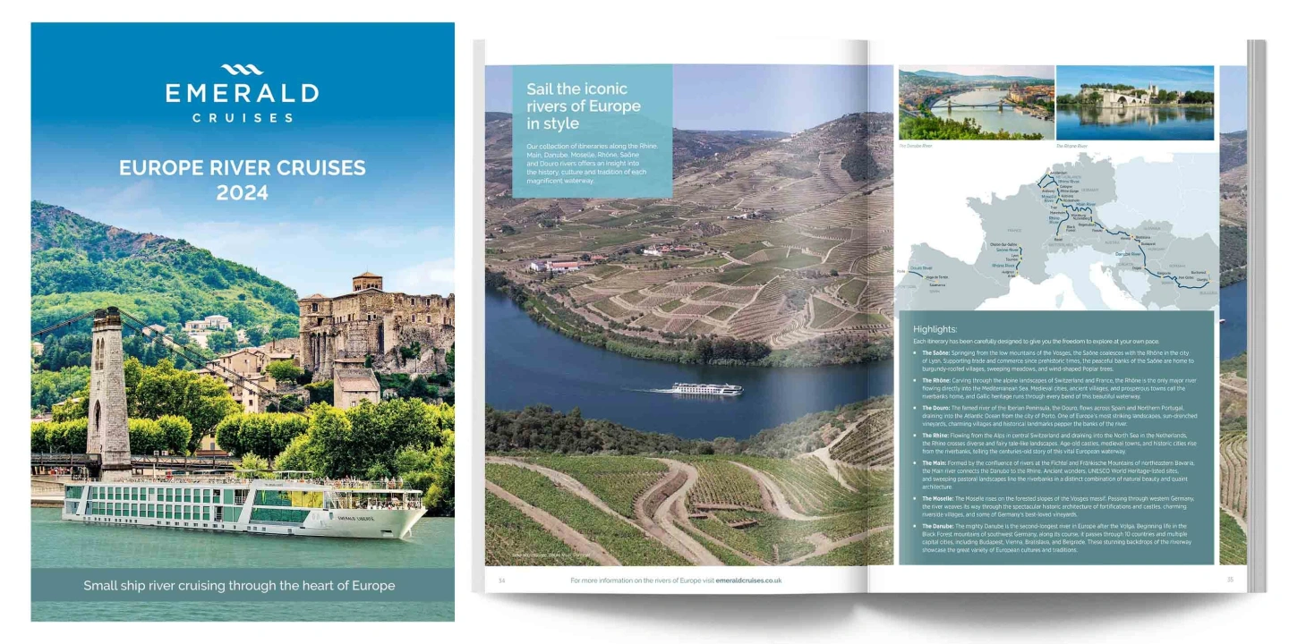 A luxury river cruise brochure, featuring a ship sailing past a hilly region, near a town with Medieval-style buildings