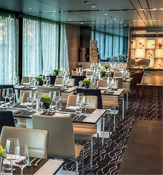 Tables in a restaurant on board a luxury river cruise ship