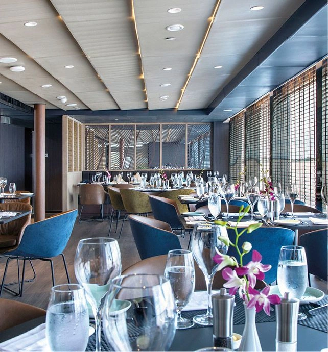 Tables in a restaurant on board a luxury river cruise ship