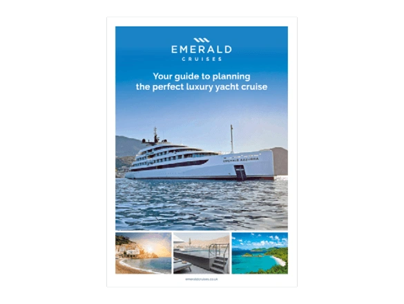 Brochure front cover, featuring river cruise ship sailing past the Hungarian Parliament Building