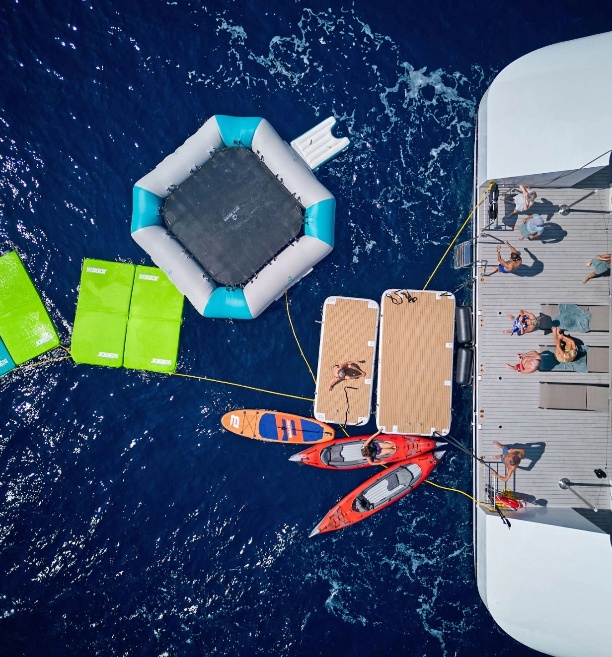 An arial view of the Emerald Sakar marina deck and water sports equipment.
