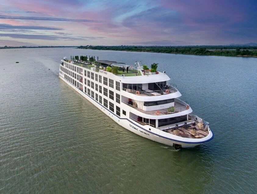 Scenic Spirit river cruise ship sailing along the Mekong River