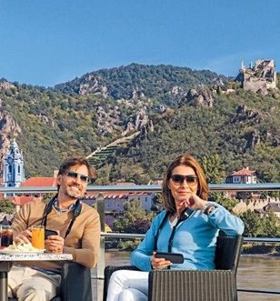 Guests enjoying on the deck of Scenic starship