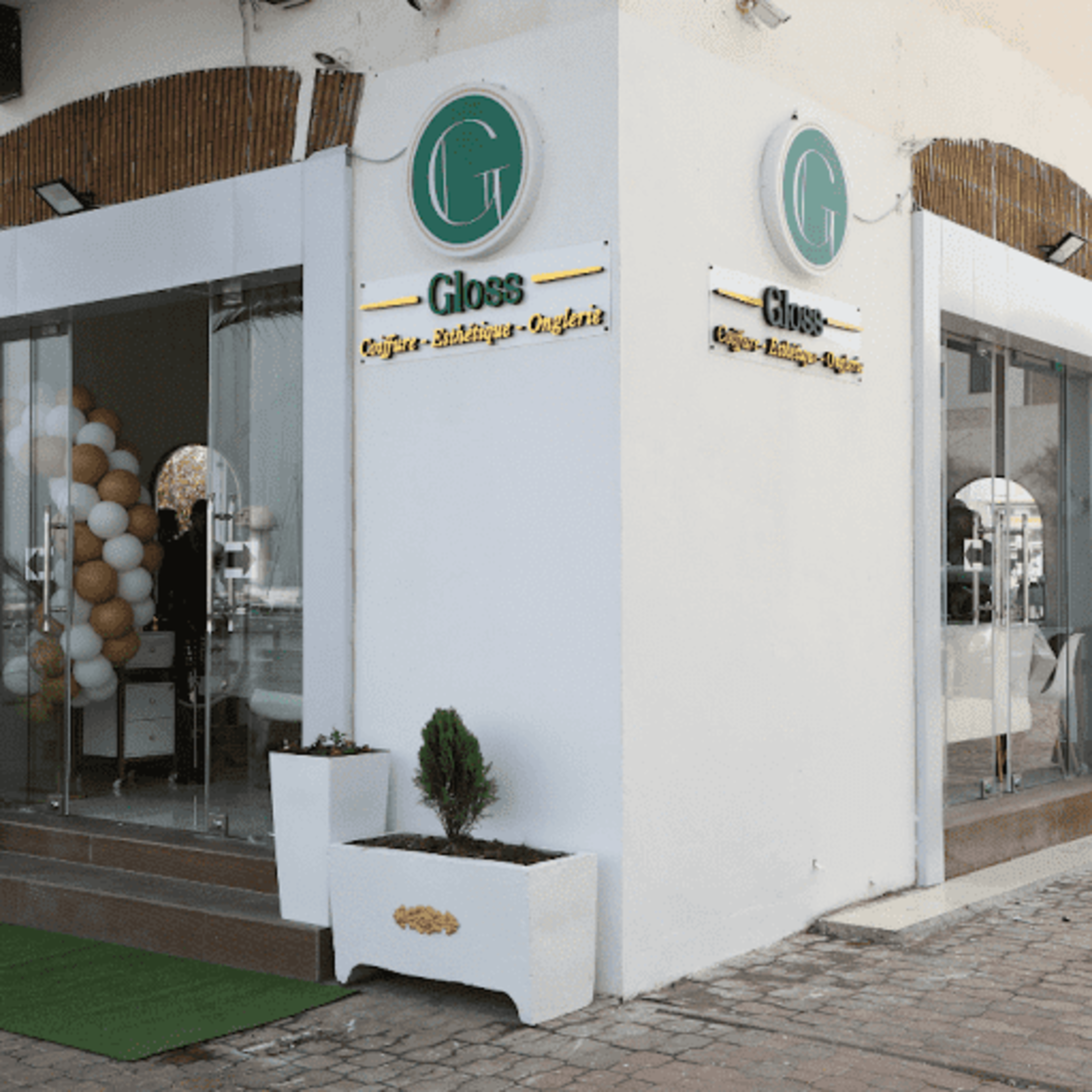 Gloss institut de beauté - logo