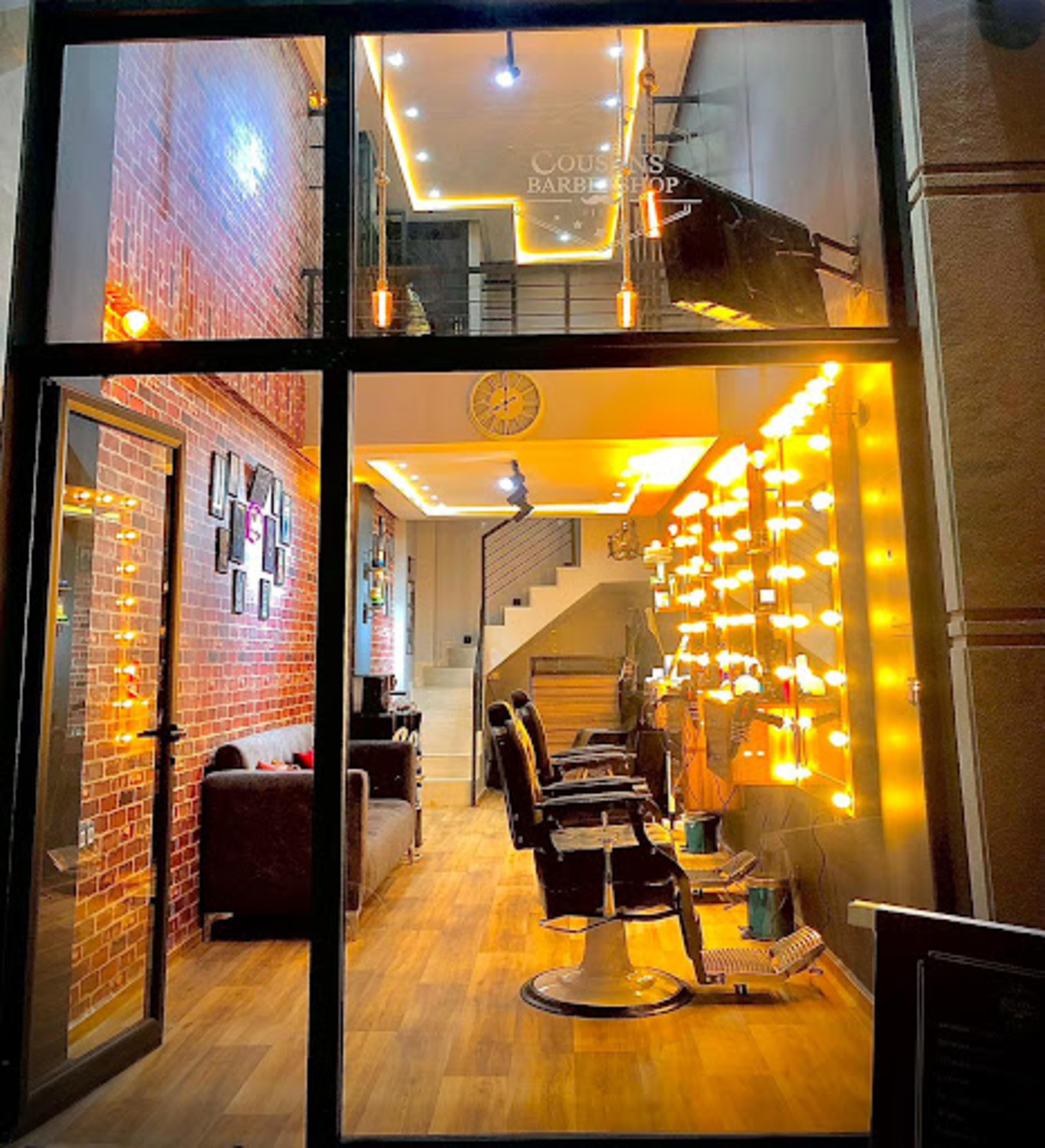 THE COUSINS BARBERSHOP - logo