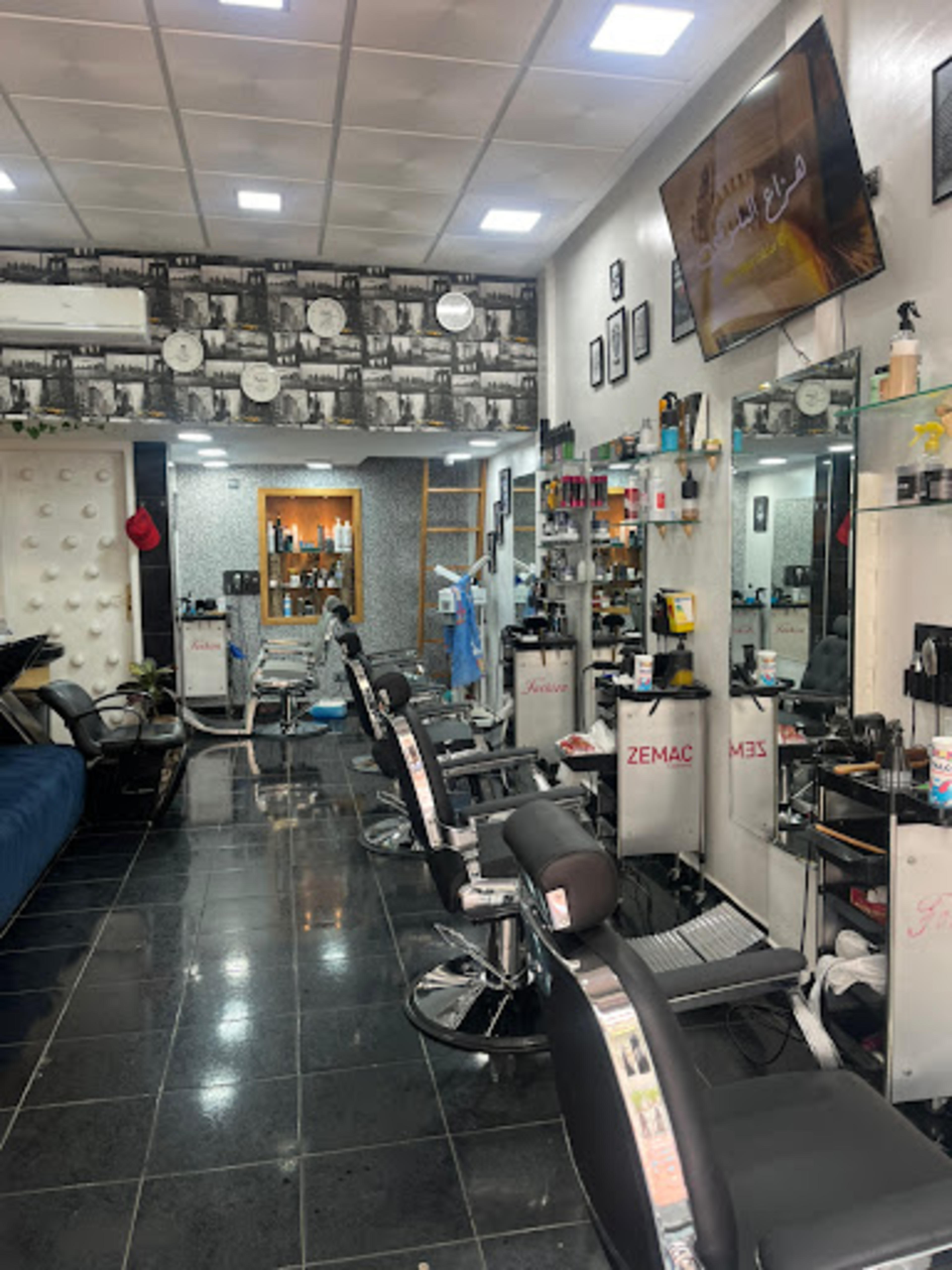 Del Bosque Barber Shop - logo