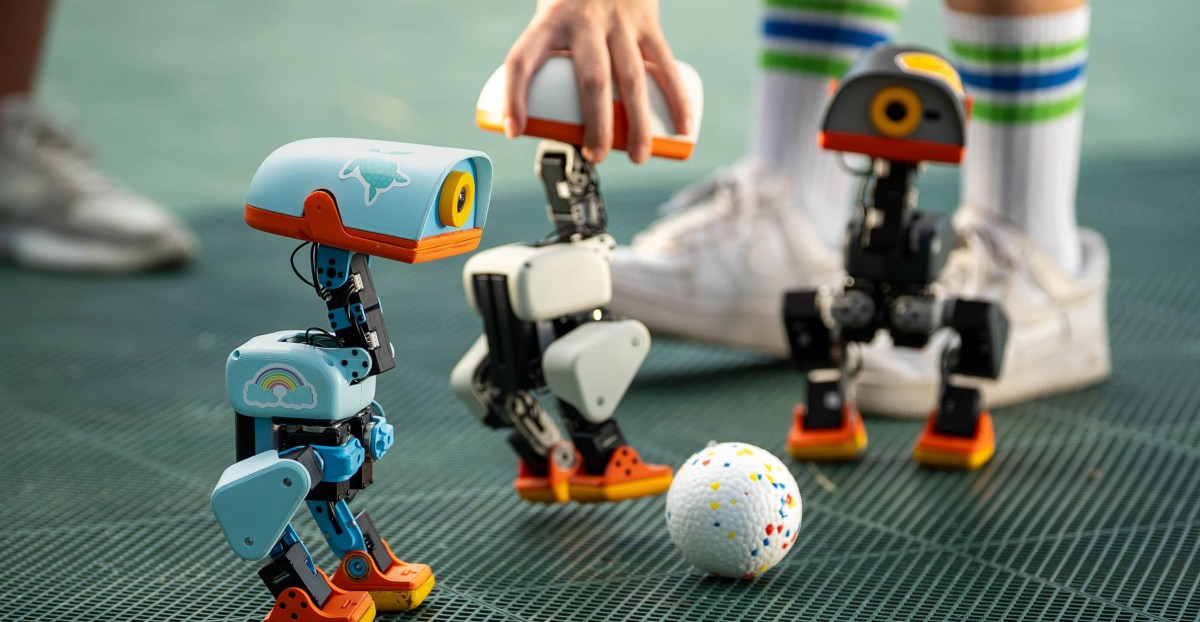 The Verge reports Hugging Face unveiled Microduck, a robot duck on rollerskates.