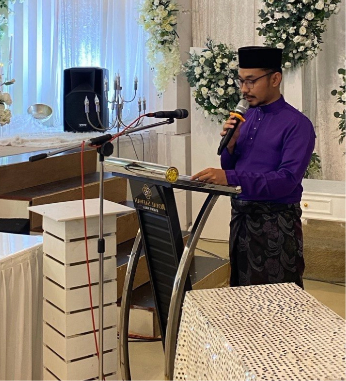 Wan Muhammad Azizi serving as an emcee
