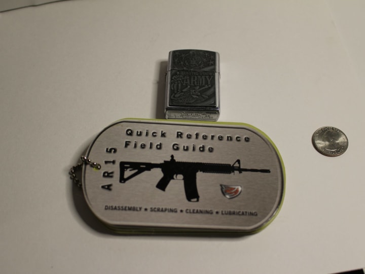 Zippo lighter and AR-15 field guide