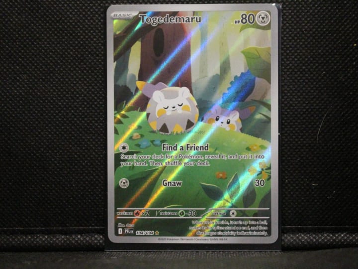 Togedemaru 104/094 Pokémon Full-Art Holo Card