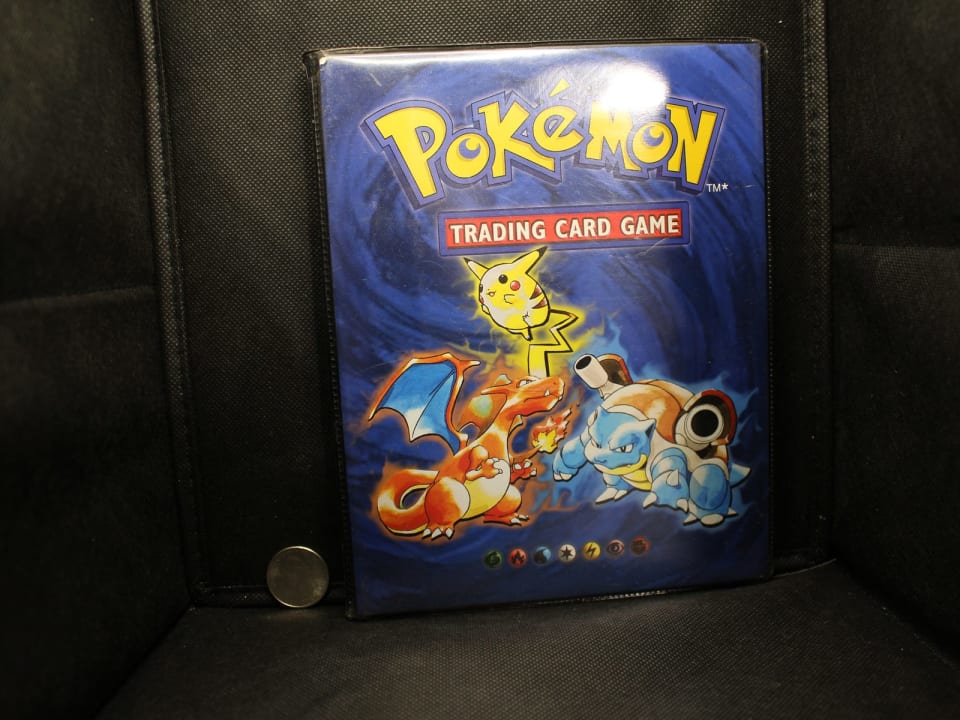 Vintage Pokémon Trading Card Binder with Tech Deck Cards