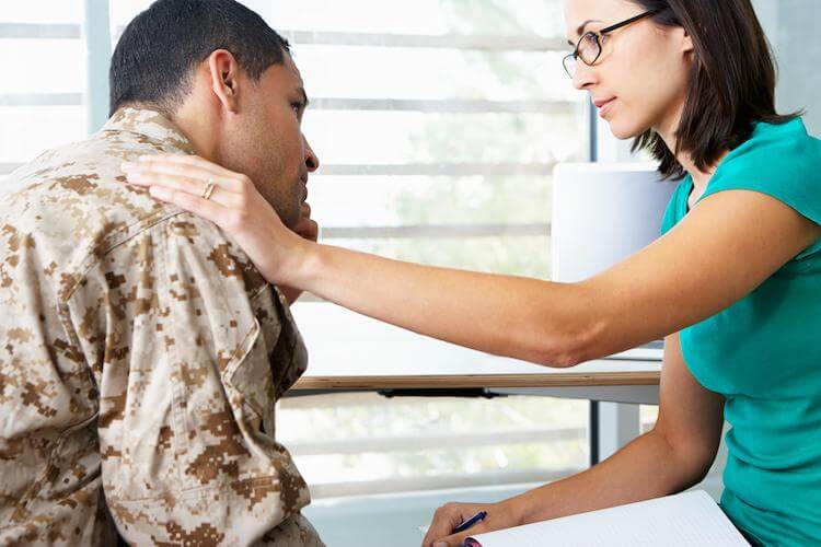 Counselor treats veteran patient suffering from PTSD.