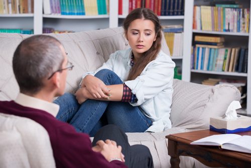 Woman sitting in a therapy session