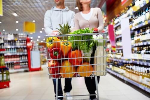 Couple shopping for healthy foods