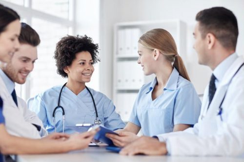 Nurse practitioner talking with patient.