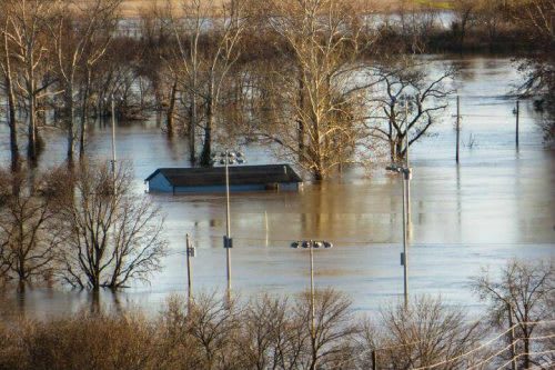 House submerged in flooding.