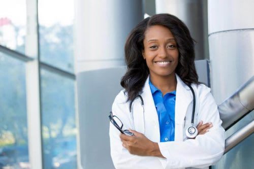 DNP nurse smiling.