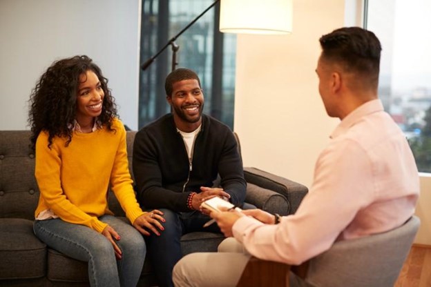 A marriage counselor meets with a couple.