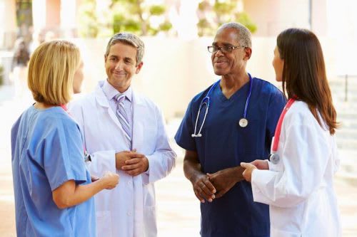 Nurses talking to one another