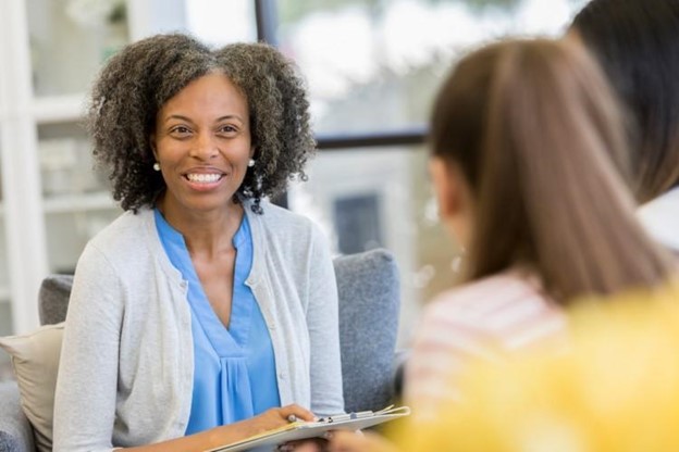 A counselor meets with a client.